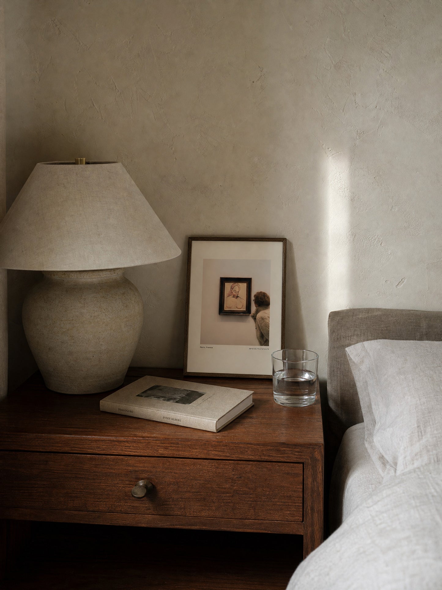 Tu As Vu by Studio Halcyon — A4 print propped on a bedside nightstand