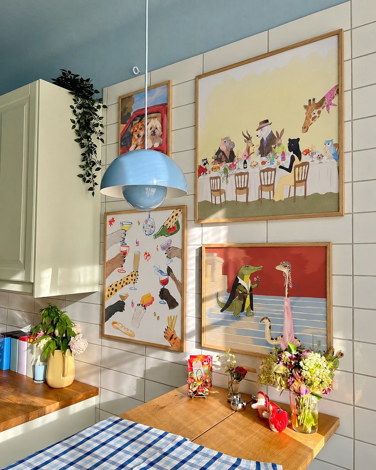 La Cena by Aanya Kaur Benipal, framed print styled in an interior