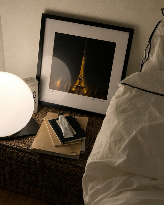 324 Metres framed in black on a bedside table
