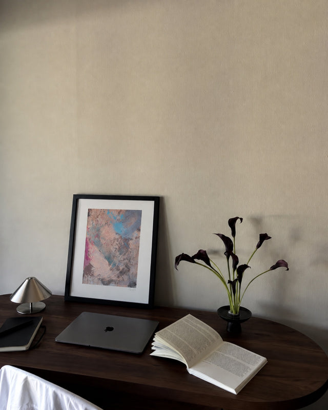 Spring III print leaning on a desk with calla lilies